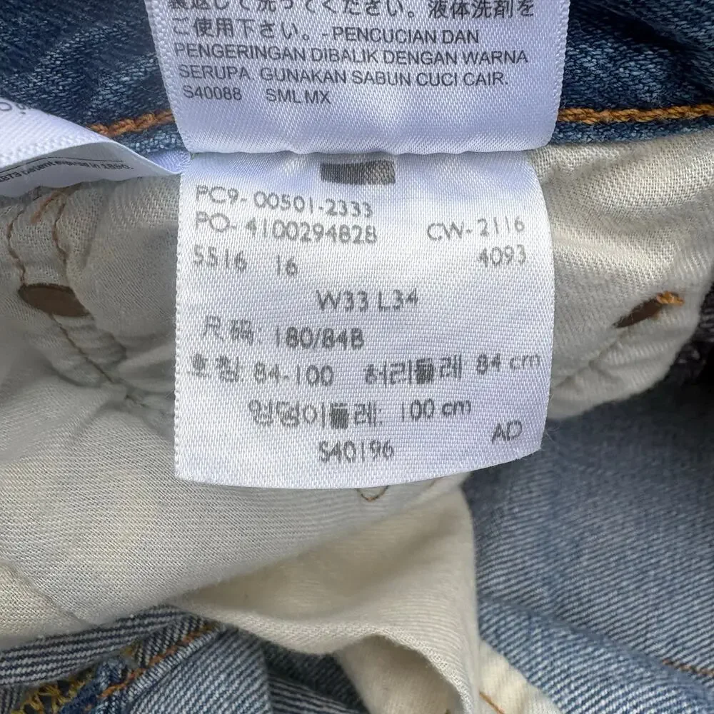 Levi’s‎ Jeans 501 33 x 34 Med Wash Button Fly Classic Casual Normcore Americana